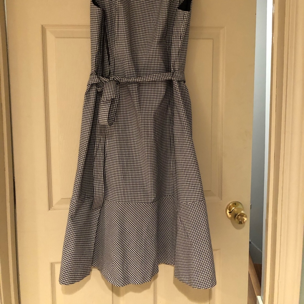 Black & white check peplum dress with belt.